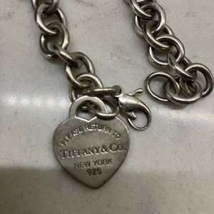 Tiffany And company heart bracelet. Length is 7 1/8 inches.